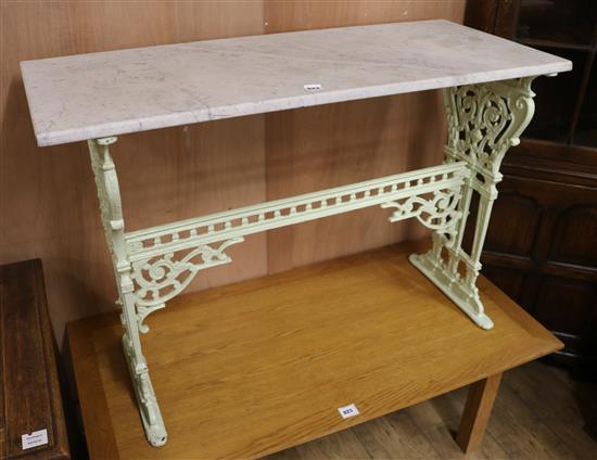 A Victorian marble topped cast iron table W.107cm